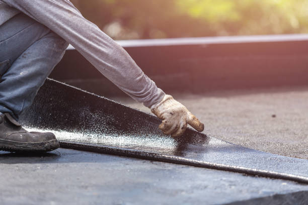 Professional Basement Waterproofing technician working in Montgomery, AL